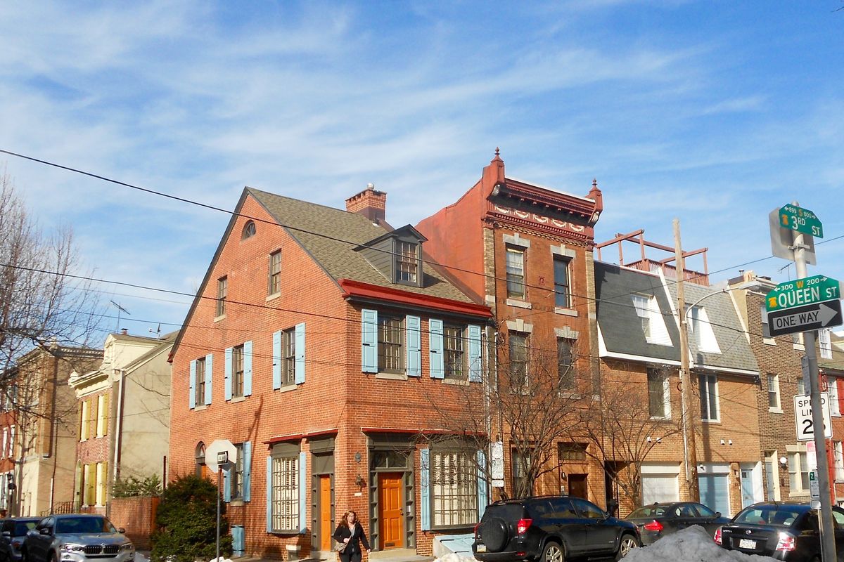 Brick rowhouses on the corner of 3rd and Queen Street in Queen Village, Philadelphia